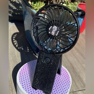 Small handheld portable personal fan